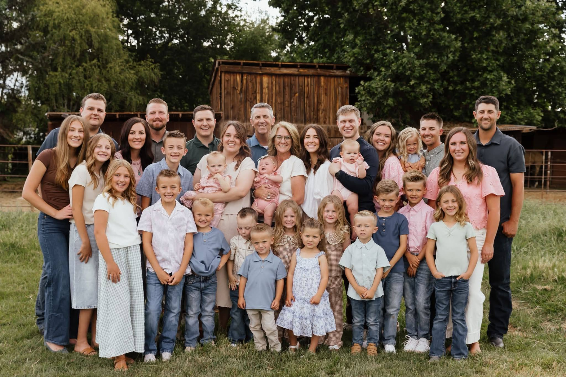 Shea Flake with his family gathered outdoors in the Arizona White Mountains